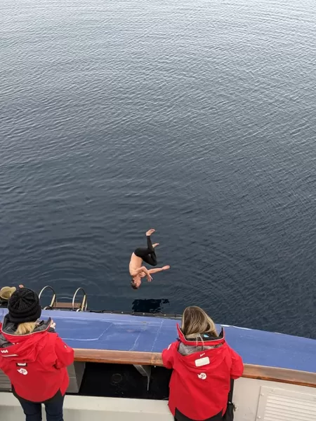 Some travelers are more brave than others, flipping and diving into the frigid waters