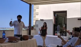 Marco toasting at the vineyard in Trapani