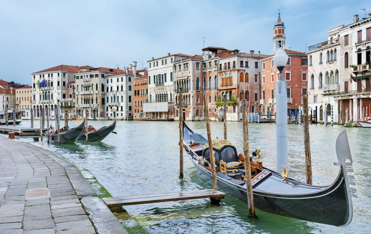 Take a classic gondola ride through Venice's canals