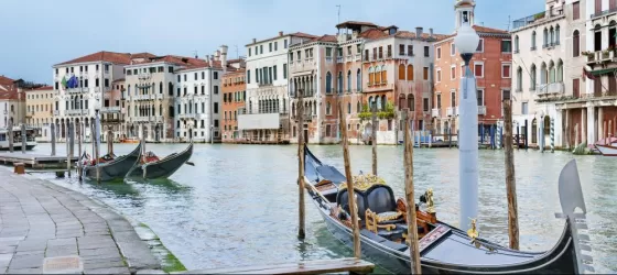 Take a classic gondola ride through Venice's canals