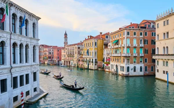 Enjoy a gondola ride through beautiful Venice