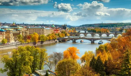 An autumn view across the Vltava river to old town Prague