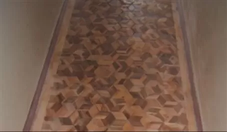 Intricate wood flooring in the hallway
