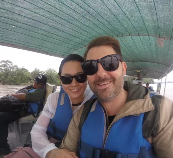 On the motorized canoe, just after landing in the Amazon.