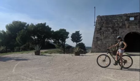 Riding bikes up to Fort George in Vis