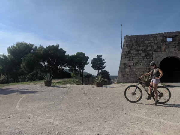 Riding bikes up to Fort George in Vis