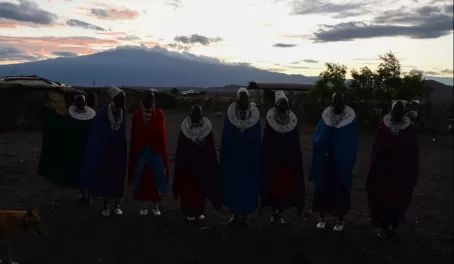 Warm and musical welcome from Maasai women into their home.