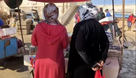 Ladies buying at the fish market - Essaouira