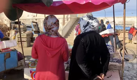 Ladies buying at the fish market - Essaouira