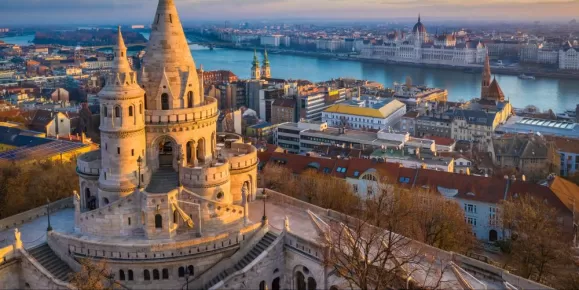 Golden sunset lights the famous Fisherman's Bastion in Budapest