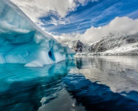 Brilliant blue icebergs in Antarctic waters