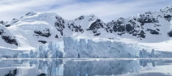 Mirror-like waters in Paradise Bay