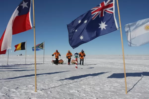 Skiers approaching the Ceremonial South Pole. Courtesy David Rootes, Antarctic Logistics & Expeditions
