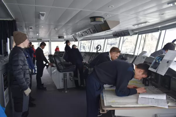 In the bridge, watching the captain and crew navigate L'Austral through ice fields.