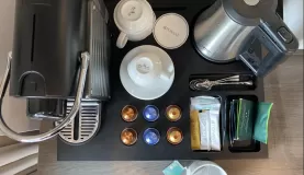 The tea and coffee bar that can be found in every room.