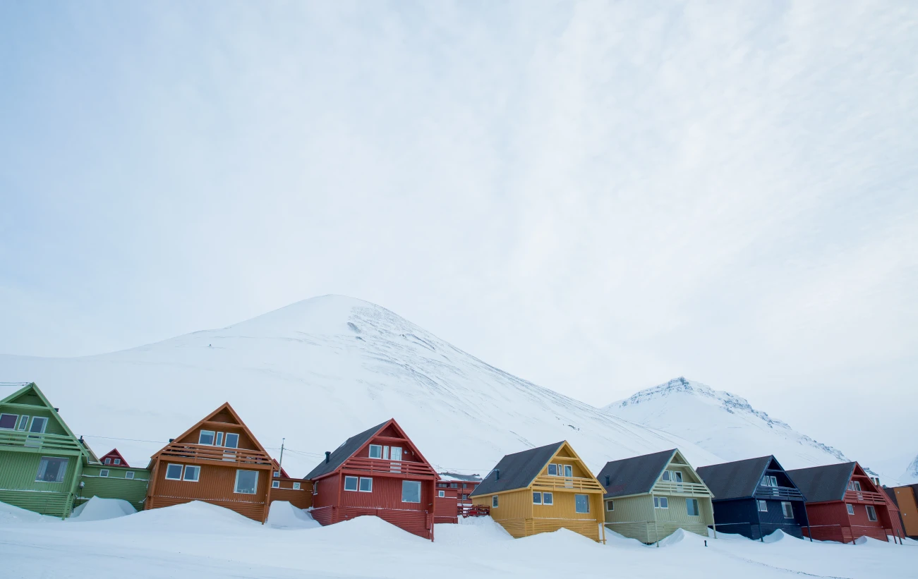 Admire the colorful houses of Longyearbyen