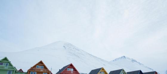 Admire the colorful houses of Longyearbyen