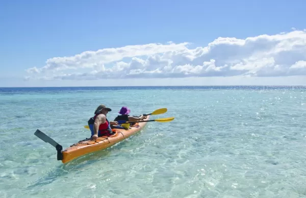 Kayaking the clear waters off the coast of Belize