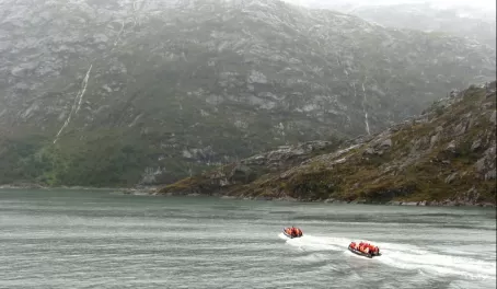 Zodiac boats heading off to fjord w/ Piloto & Nena Glaciers