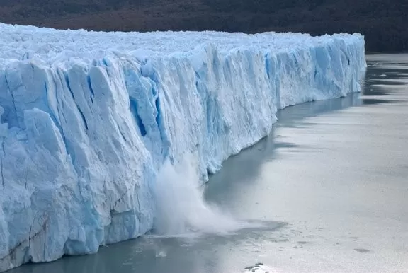 Piece of ice collapses as the glacier advances