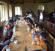 School children eating breakfast