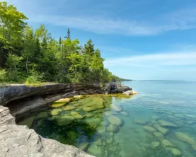 Explore the rocky shores and clear waters of Lake Superior