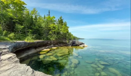 Explore the rocky shores and clear waters of Lake Superior