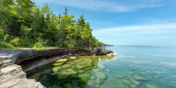 Explore the rocky shores and clear waters of Lake Superior