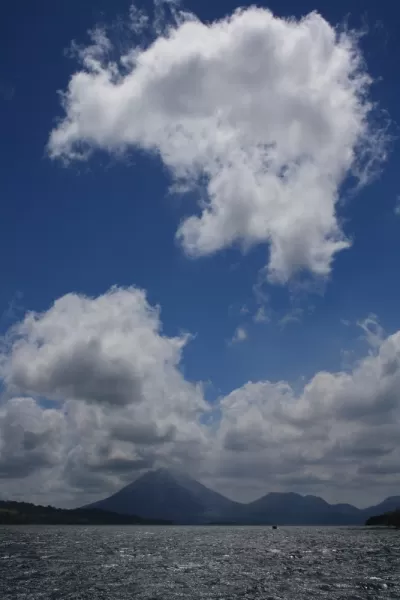 Arenal Volcano seen across Lake Arenal
