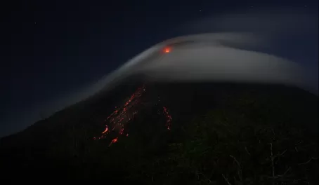 Hot rocks erupting fom Arenal Volcano