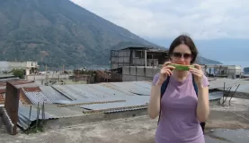Eating watermelon on the roof of the Santiago market