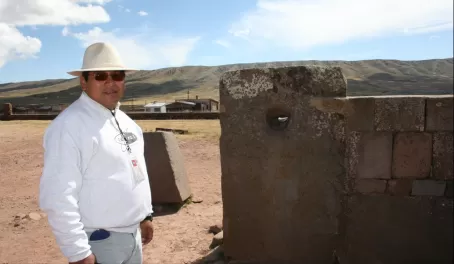Juan Carlos and the "ear canal" at Tiwanaku ruin