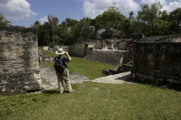 Traveler photographing Maya ruins in Belize