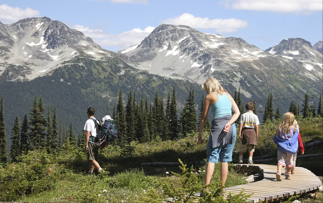 Family hiking on a tour of Alaska