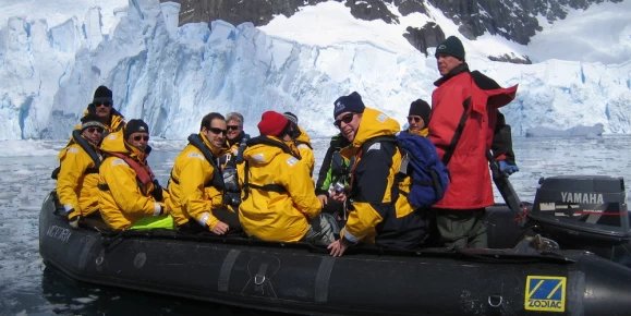 Travelers on a zodiac tour in Antarctica