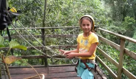 Hanging out on the platform after a rainforest zip line adventure!