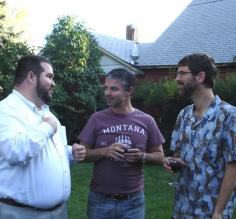 Fabio, Gabriel and Brian catch-up over good wine