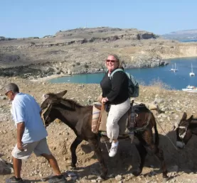 Riding burros in Greece.