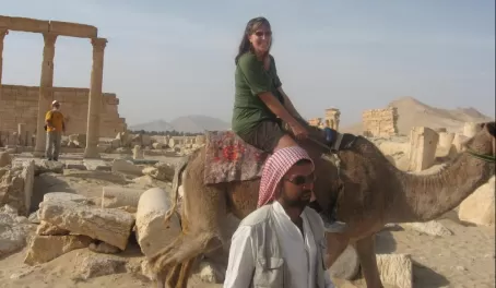 Riding a camel through the ruins