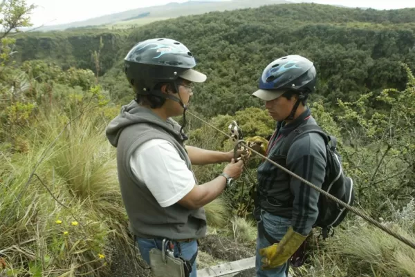 Getting clipped into the zipline for a bird's eye view of the Ecuadorian forest!