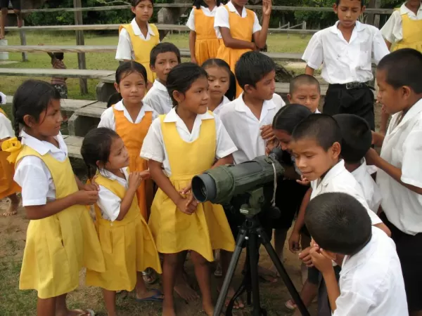 School children with a telescope