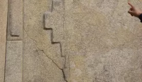 Incan symbol carved into the stone foundation