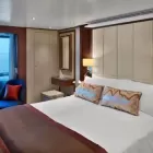The bedroom at the Seaborn Ovation Grand Wintergarden Suite.