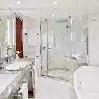 Luxurious bathroom of the Grand Wintergarden Suite.