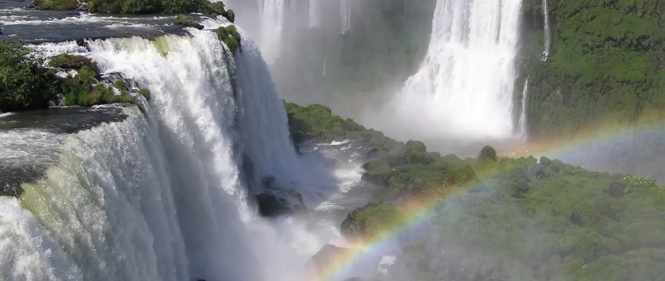 Beautiful rainbow in the mist of Iguazu Falls