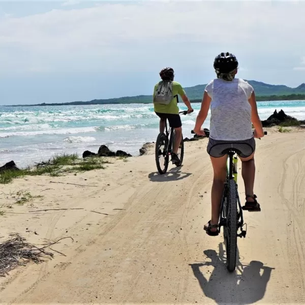 Biking along Galapagos Beach