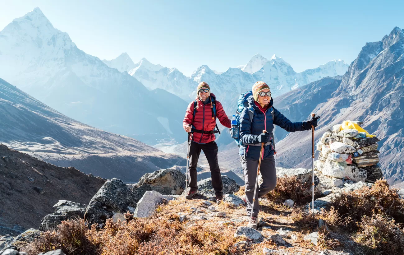 Couple following Everest Base Camp trekking route near Dughla 4620m