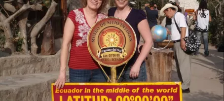 Mom and I standing on either sides of the Equator.  