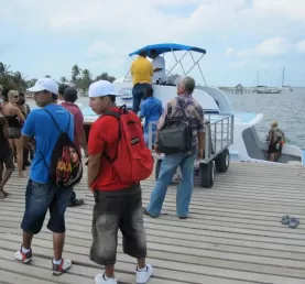 Arrived at Caye Caulker! - Waiting for our bags