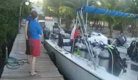 Getting ready to board the boat for the 3-tank dive to Turneffe